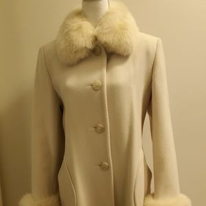 Glamorous ladies coat with fur collar